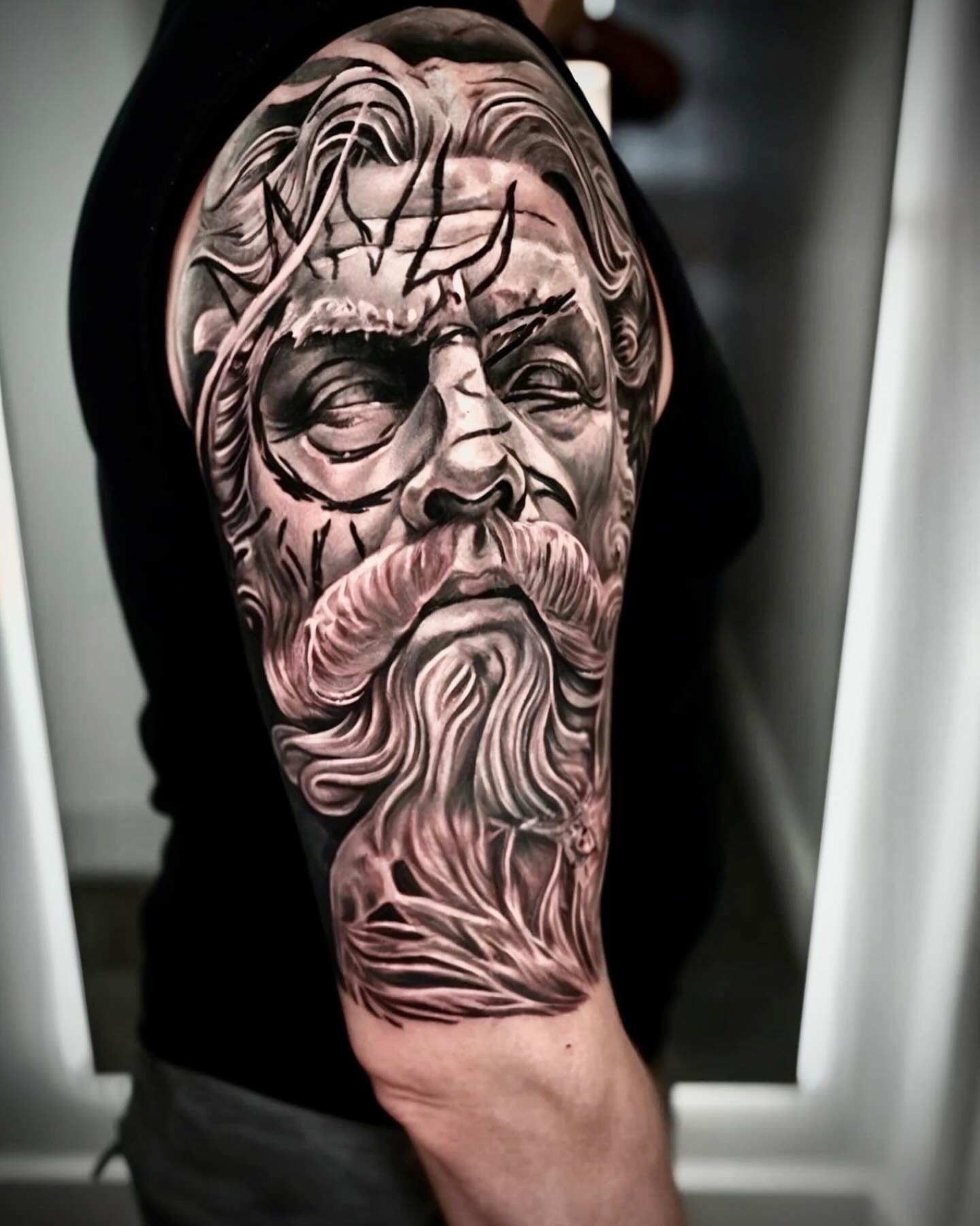 Ancient man realism tattoo on the forearm by Gabriel Garcia
