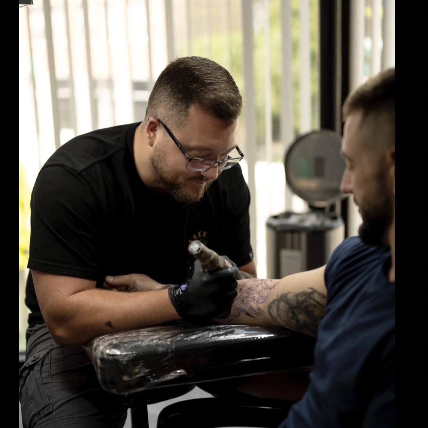 Dragon American traditional tattoo on the forearm by Lukasz Olszanski