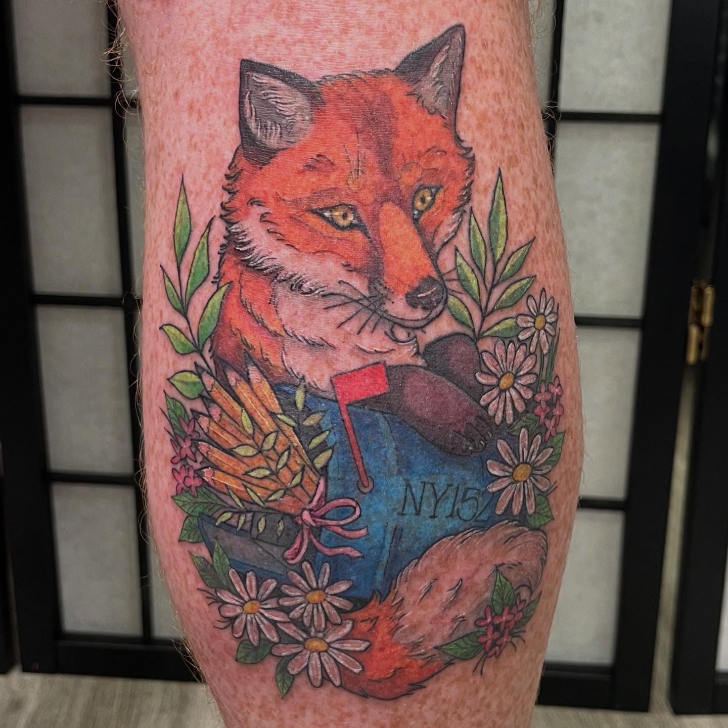 Fox with flowers realism tattoo on the forearm by Tattoos by Gina Palladino