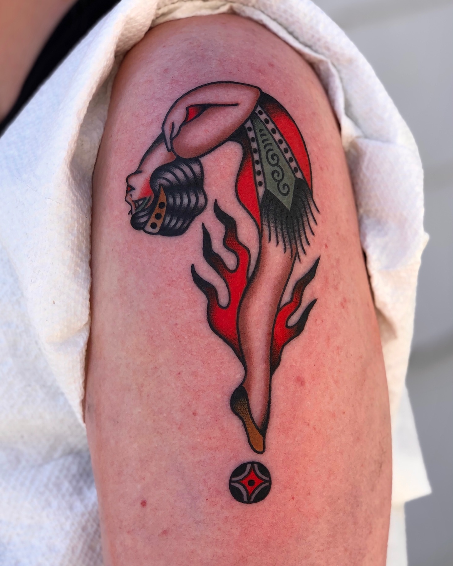 Woman with flame American traditional tattoo on the forearm by EVA Traditional Tattoos