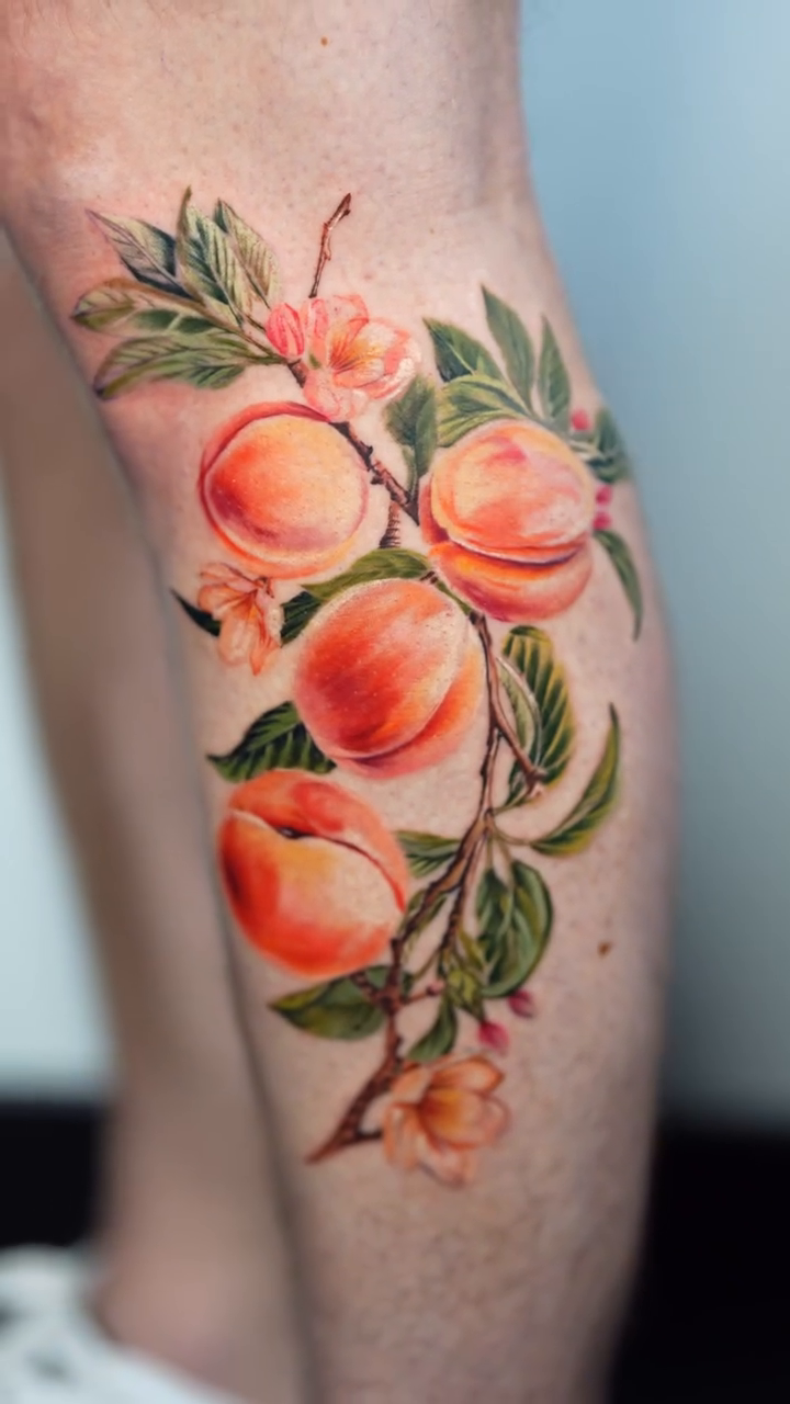 Peaches on a branch realism tattoo by Henry