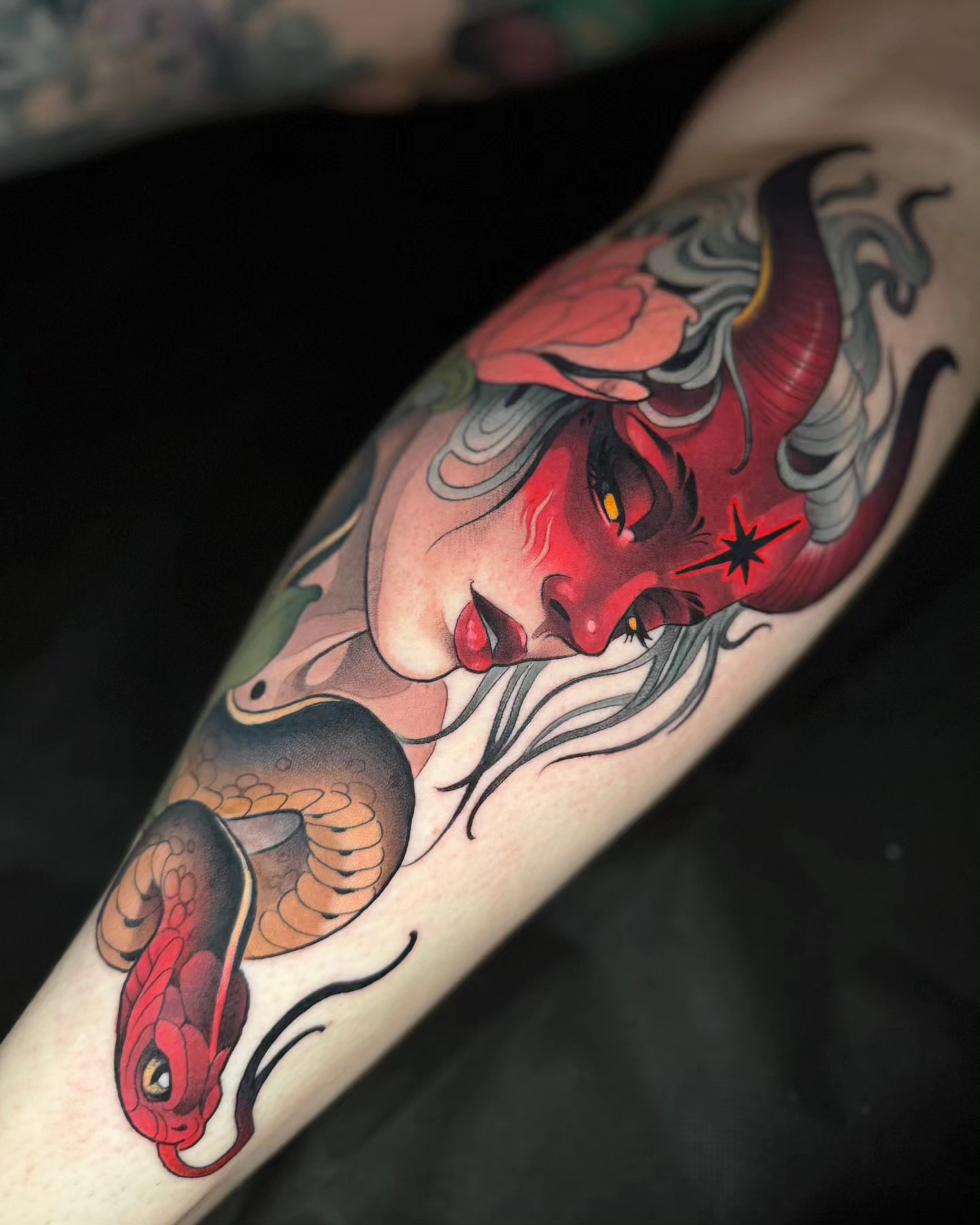 Woman with snake American traditional tattoo on the forearm by Freddie Brown, Lombard, IL