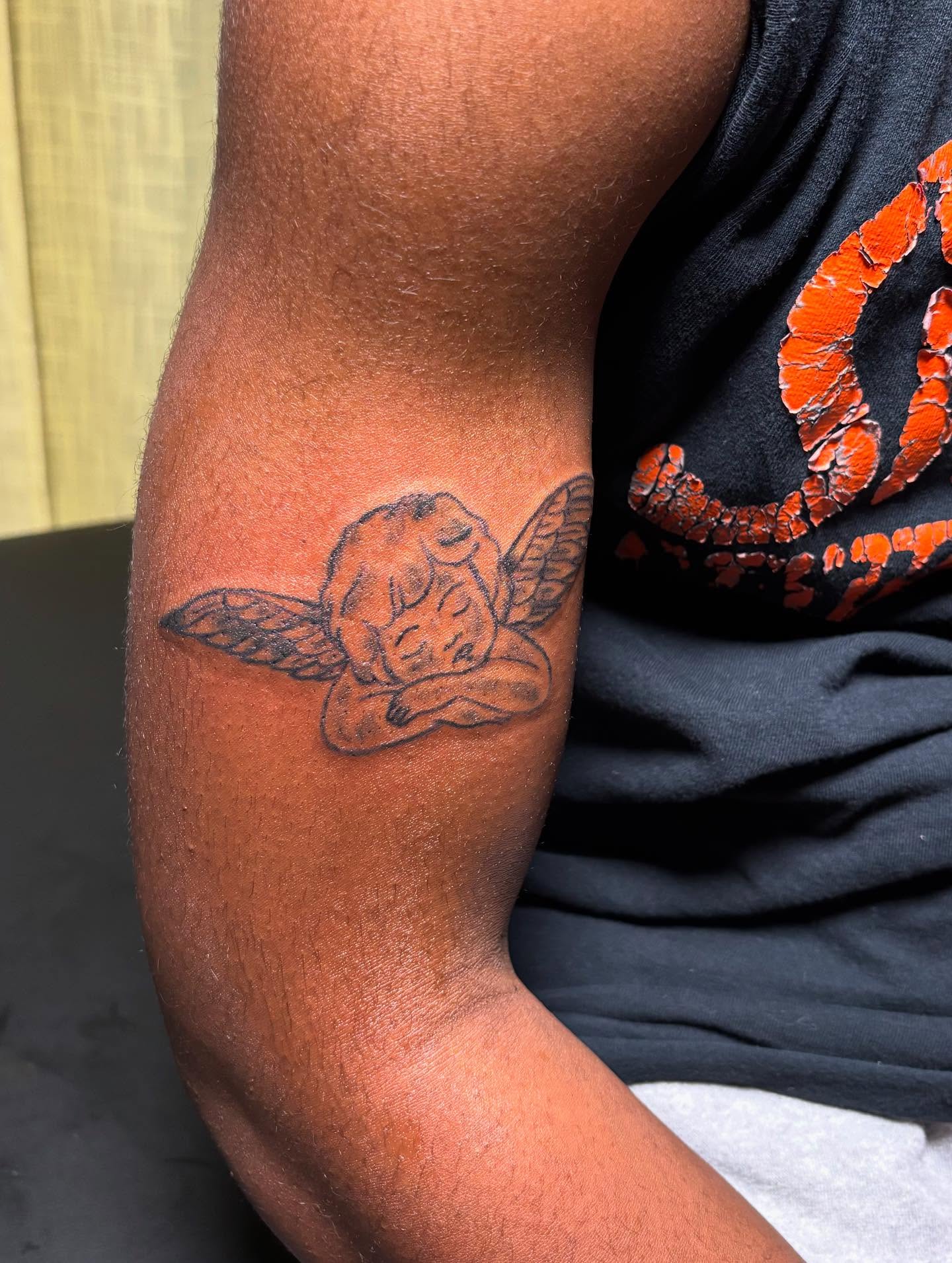 Angel black and grey tattoo on the forearm by Mc X Happo