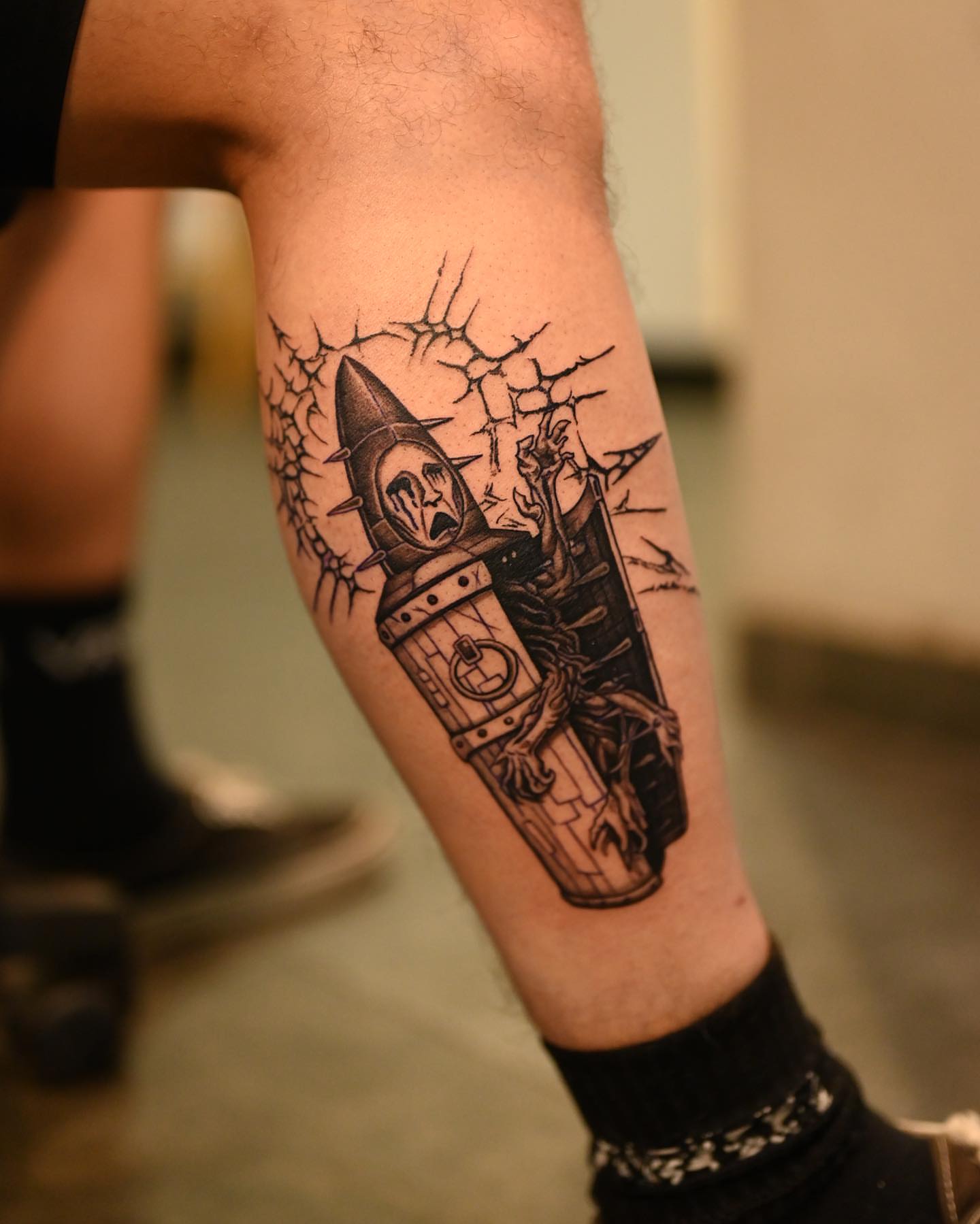 Orc in armor dark realism tattoo on the forearm by Navei
