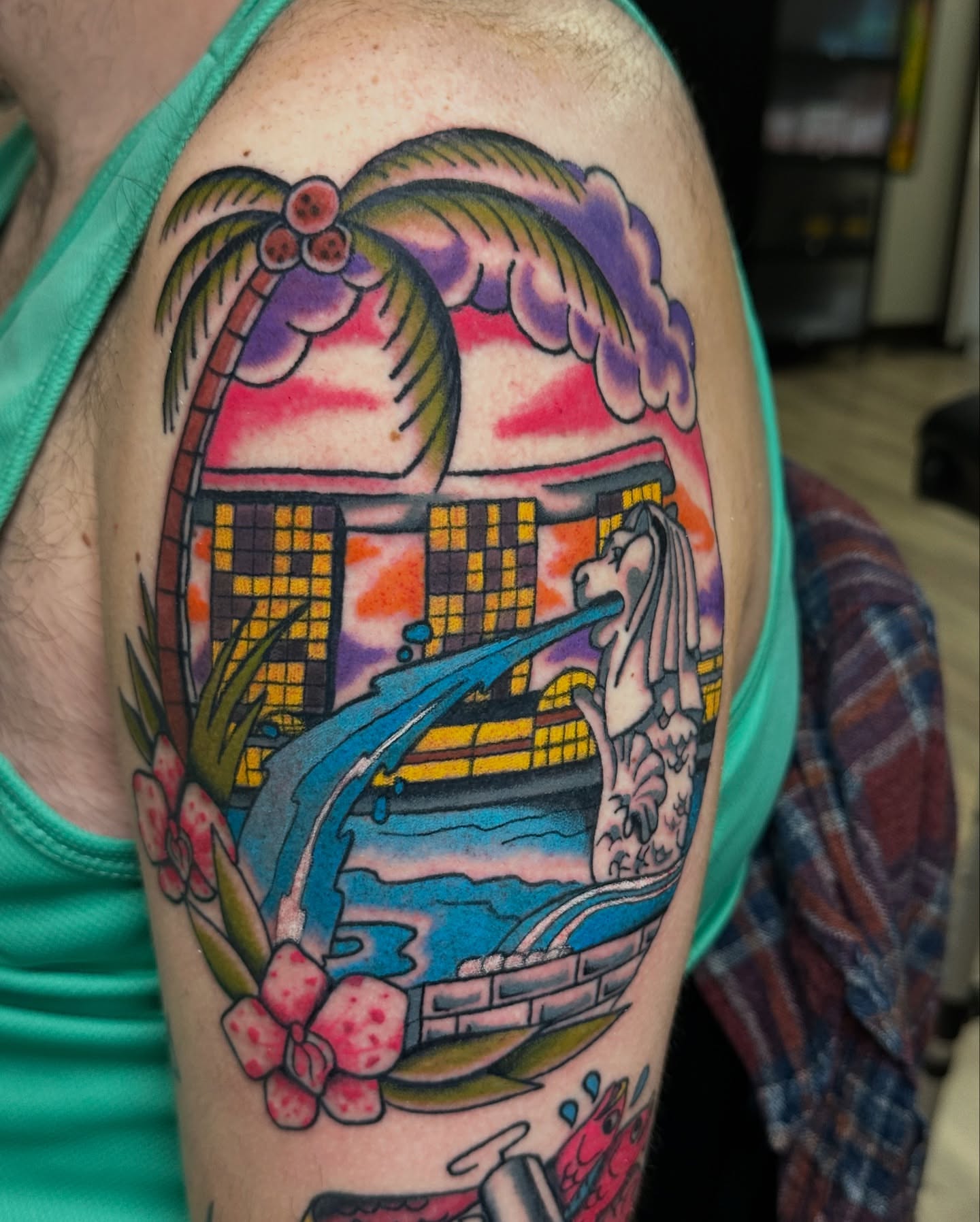 Mermaid and waterfall American traditional tattoo on the shoulder by Emily Masa