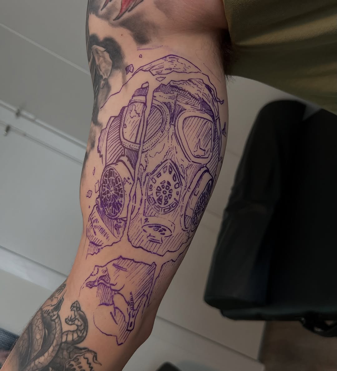 Gas mask outline sketch tattoo on the forearm by James ⚡️ Tattoo Artist