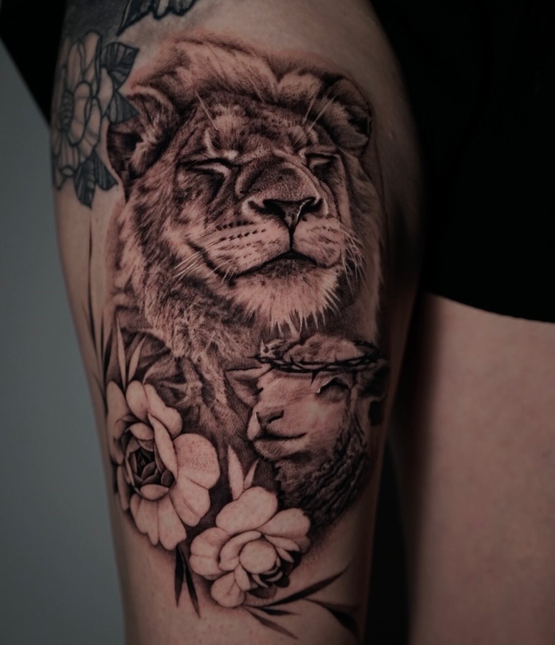 Lion and lamb realism tattoo on the forearm by Sabrina Lakhaysy, Fort Worth, Texas