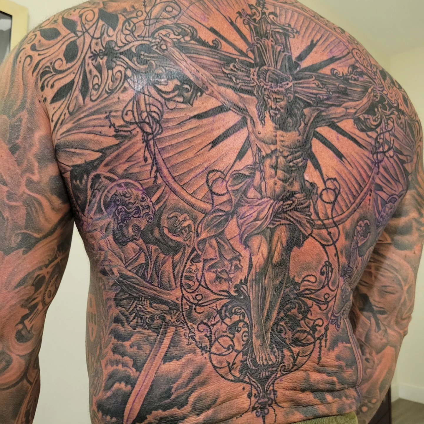 Christian crucifixion realism tattoo on the back by Beto Tats, Round Rock, Texas