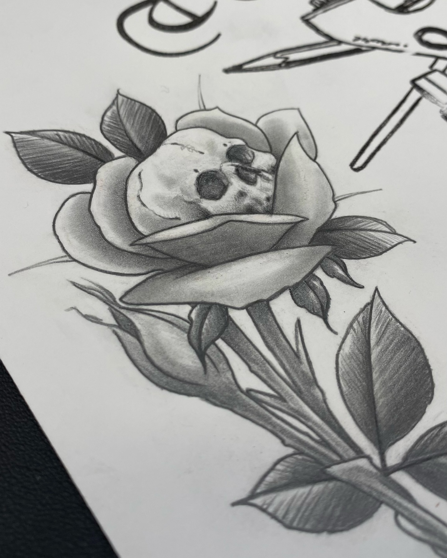 Rose with skull realism tattoo by Jesse Ortega