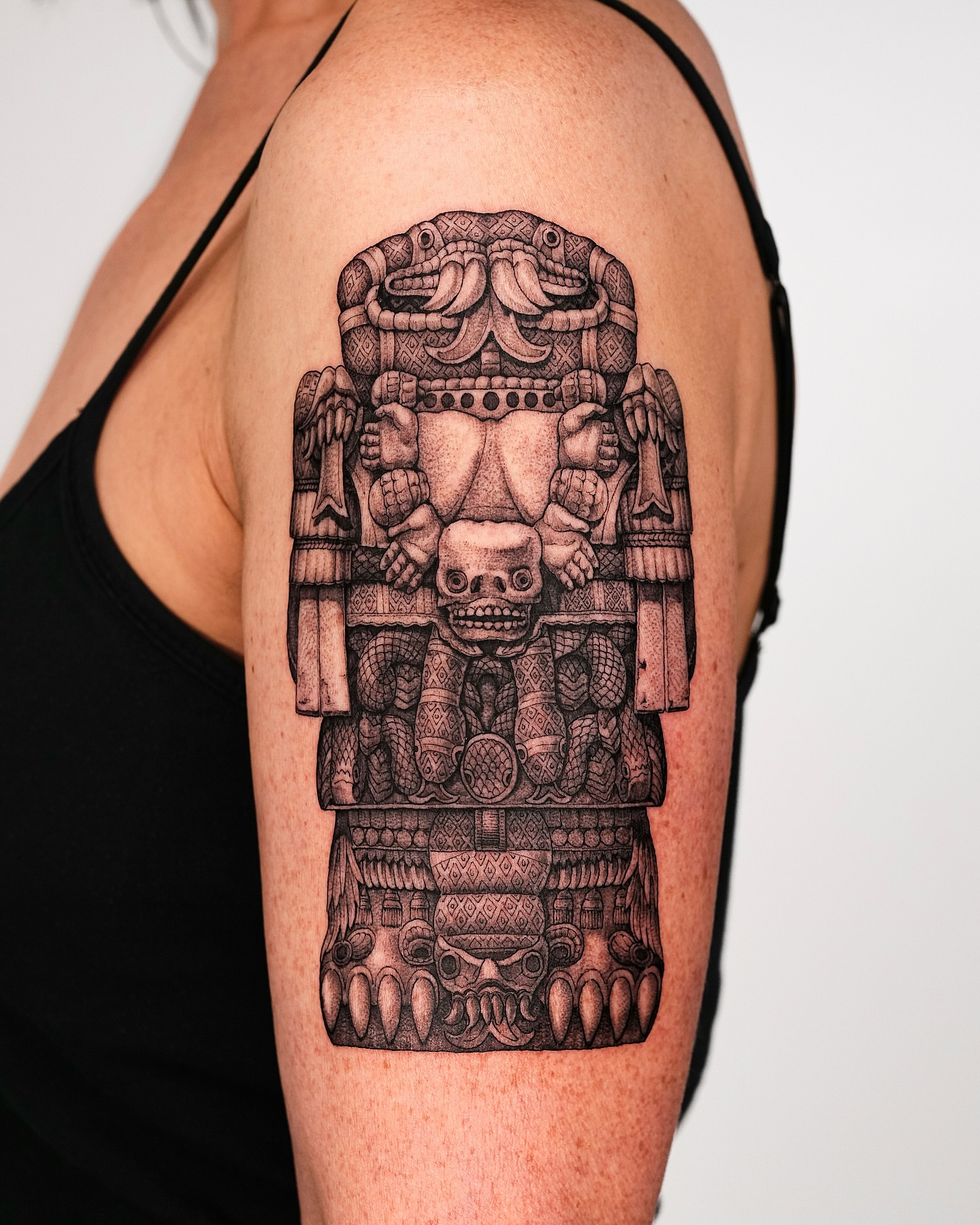 Ancient deity geometric tattoo on the shoulder by Intat