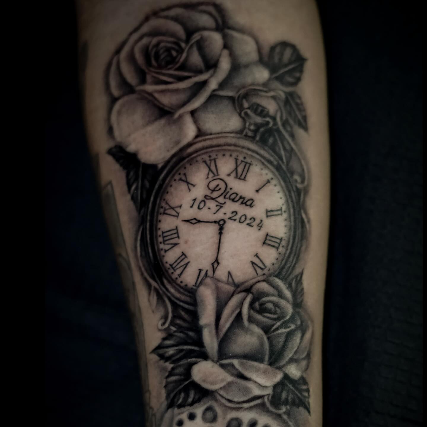 Clock and roses realism tattoo on the forearm by Cristen Aro