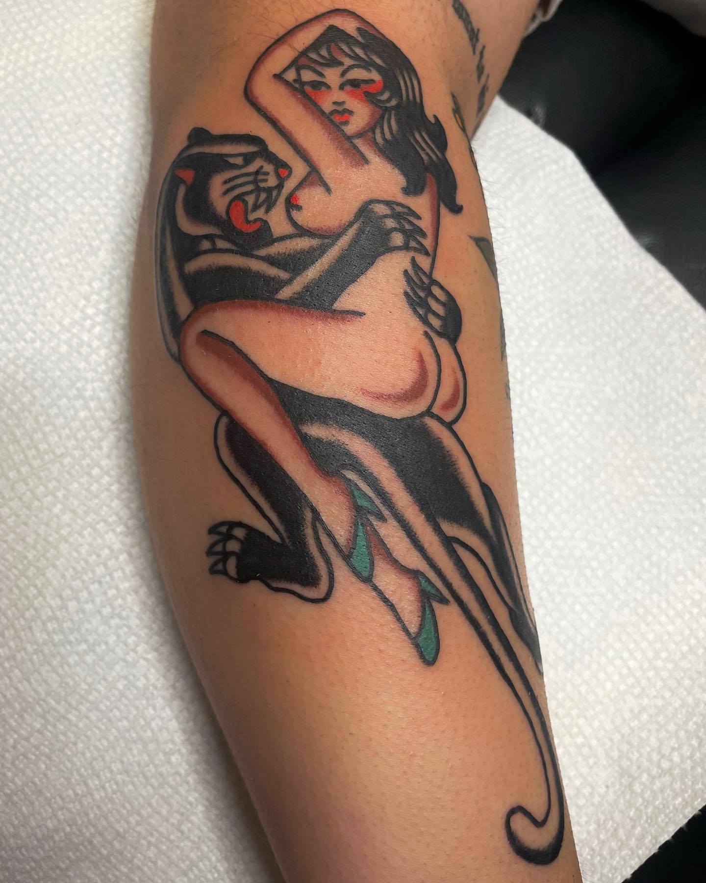 Woman and panther American traditional tattoo on the forearm by nancy❣️