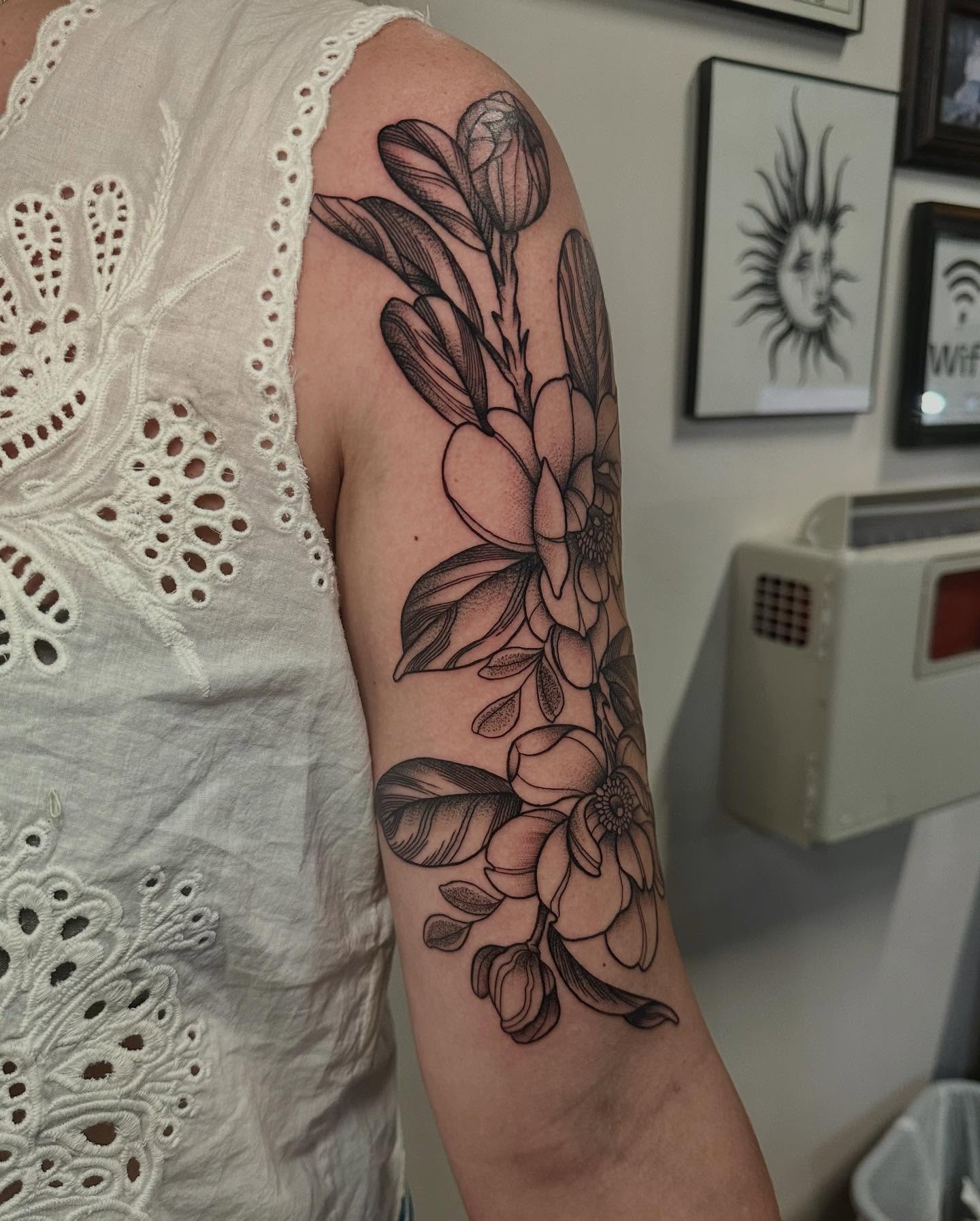 Magnolia flowers black and grey tattoo on the forearm by Abby ✣ fineline and blackwork ✣