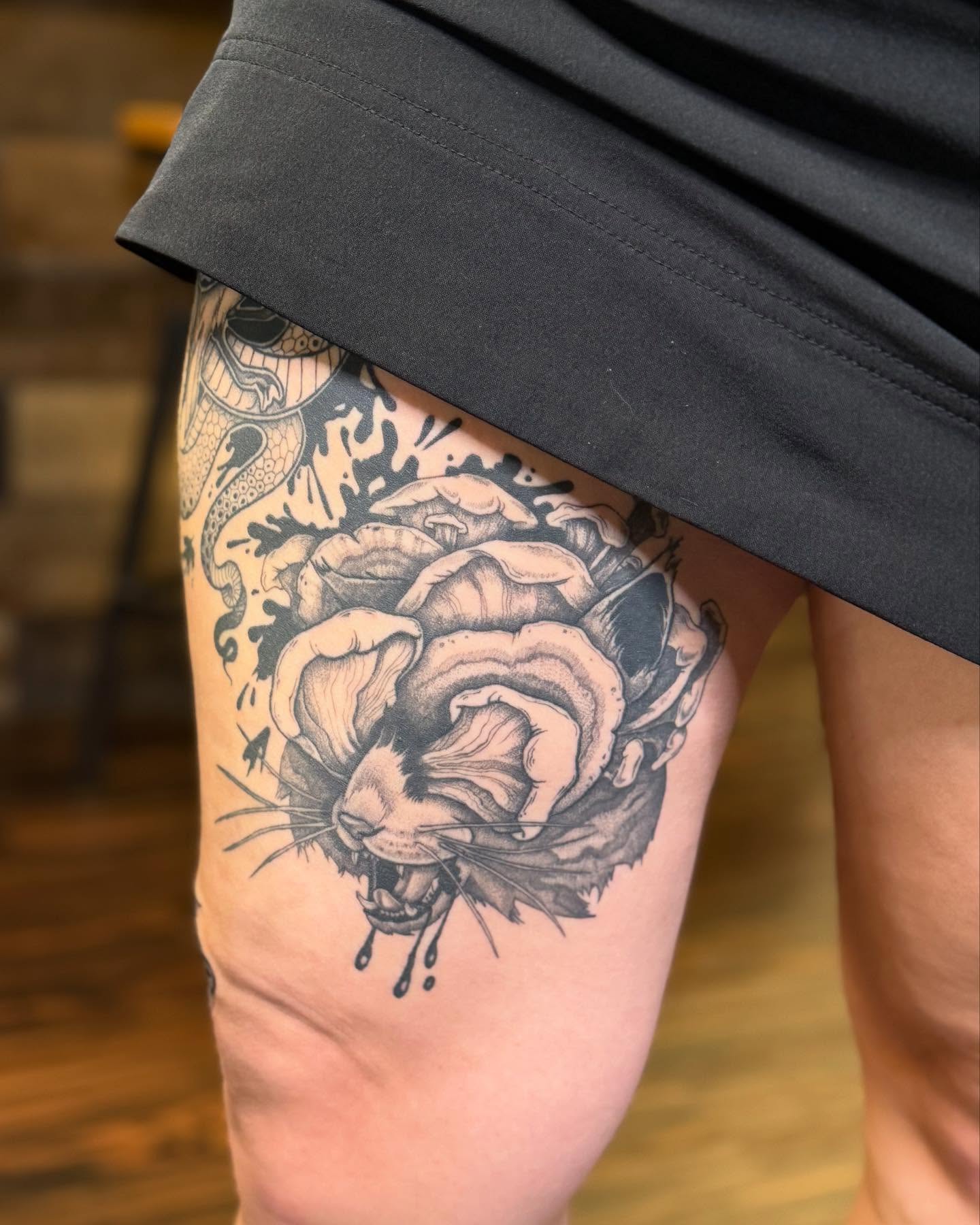 Rose realism tattoo on the thigh by Katie Stacy