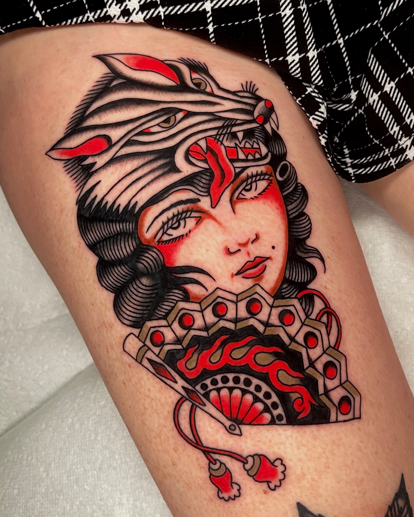 Geisha American traditional tattoo on the thigh by Chase Tucker