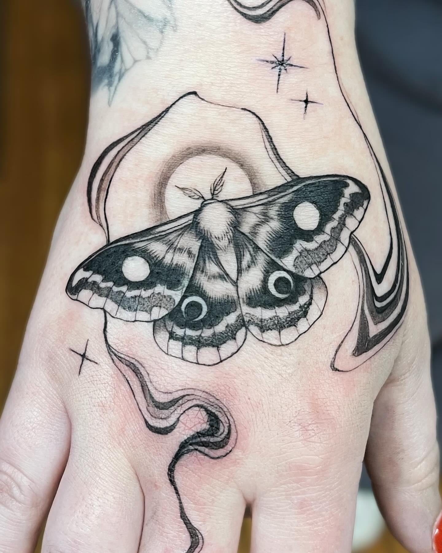 Moth black and grey tattoo on the hand by π‘πΆπΈπ½ππ ππΎππππ