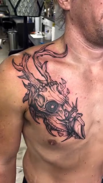 Skull with antlers dark realism tattoo by Ryan Walker