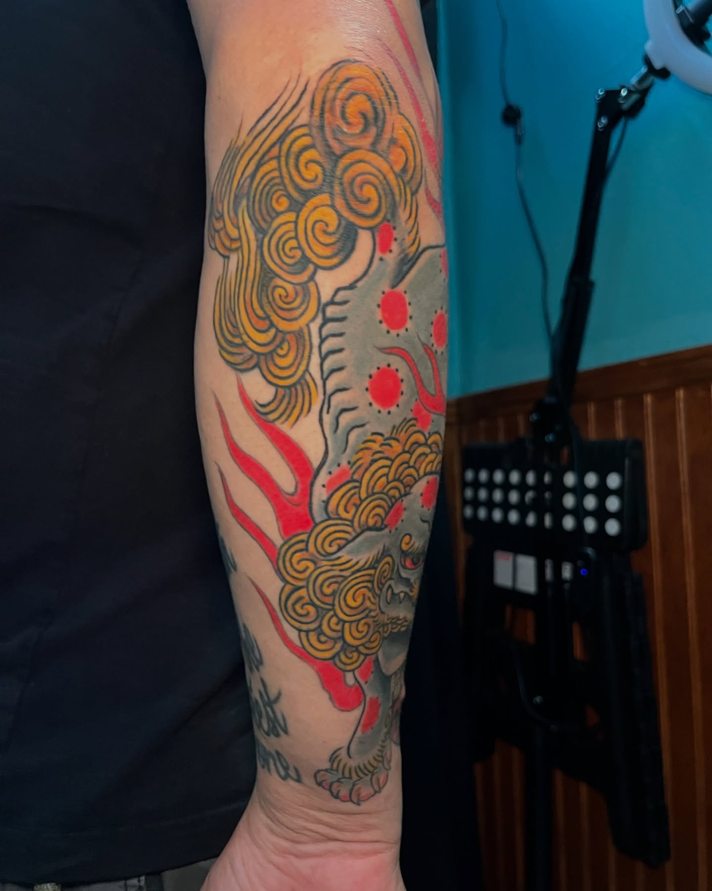 Lion japanese irezumi tattoo on the forearm by Andrew Snowden