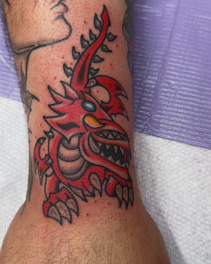 Red dragon japanese irezumi tattoo on the forearm by Olive Kelley