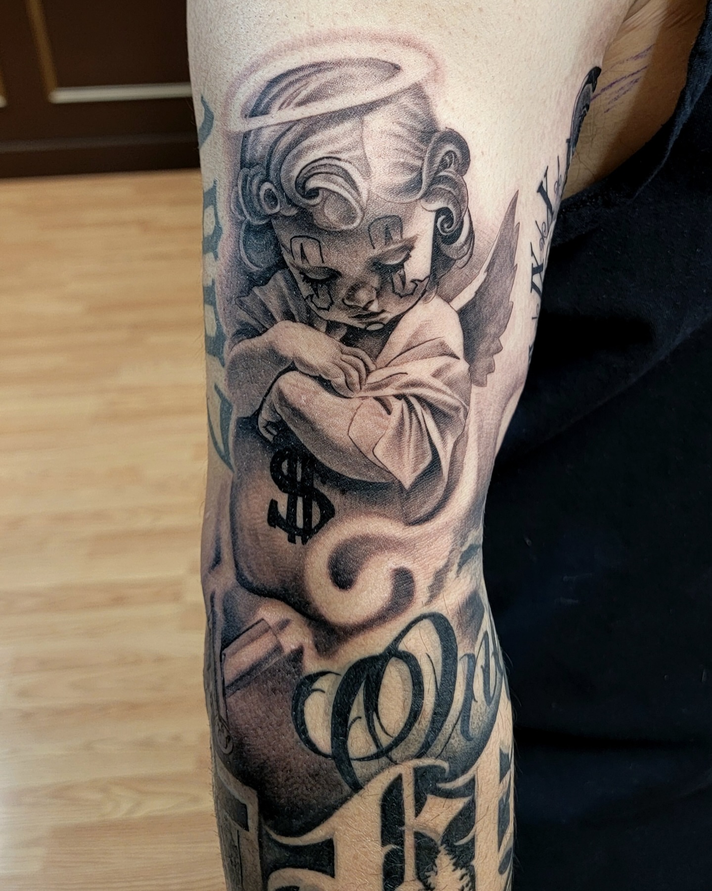 Tattoo by @lougottitattoo — black_and_grey, realism