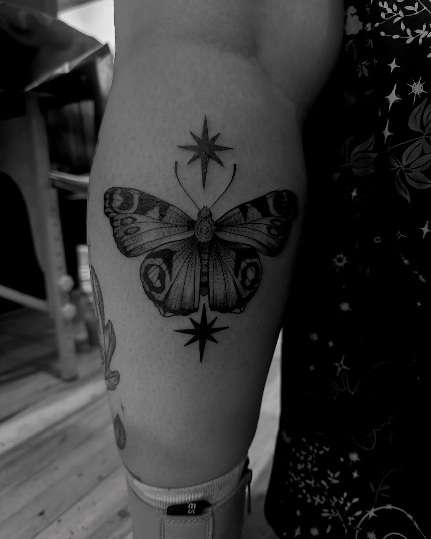 Butterfly and stars realism tattoo on the thigh by Desireé Keys, Midvale, Utah