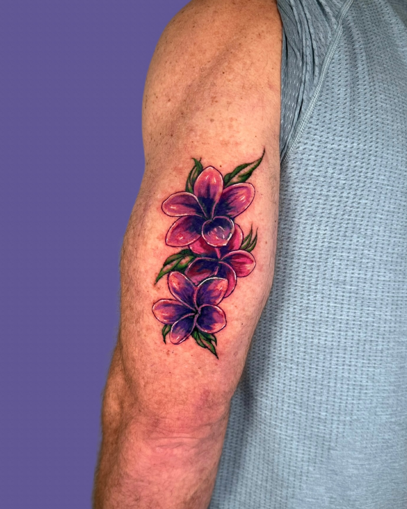 Orchids new school tattoo on the forearm by Diana
