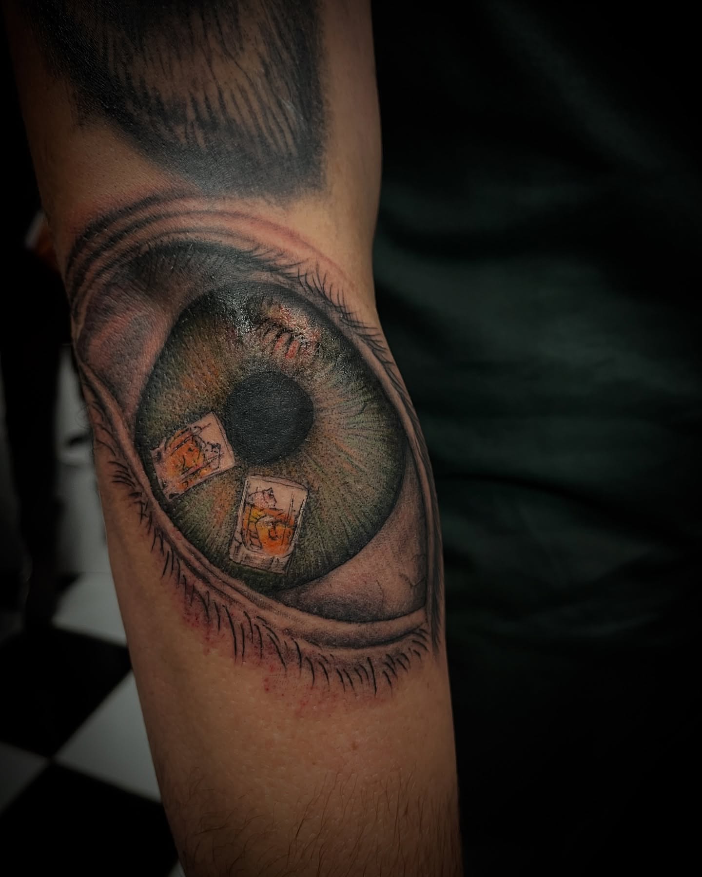 Eye realism tattoo on the forearm by Christa Martinez