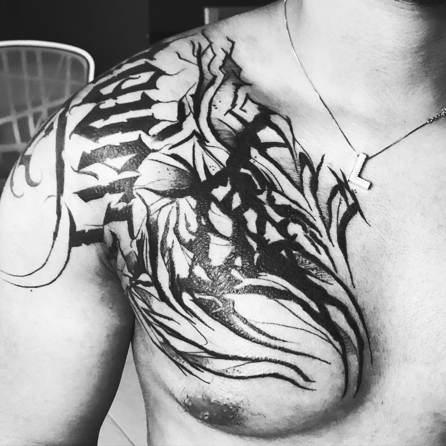 Flaming heart tribal tattoo on the chest by Tattooart-gotha, Juchitan, Oaxaca, Mexico