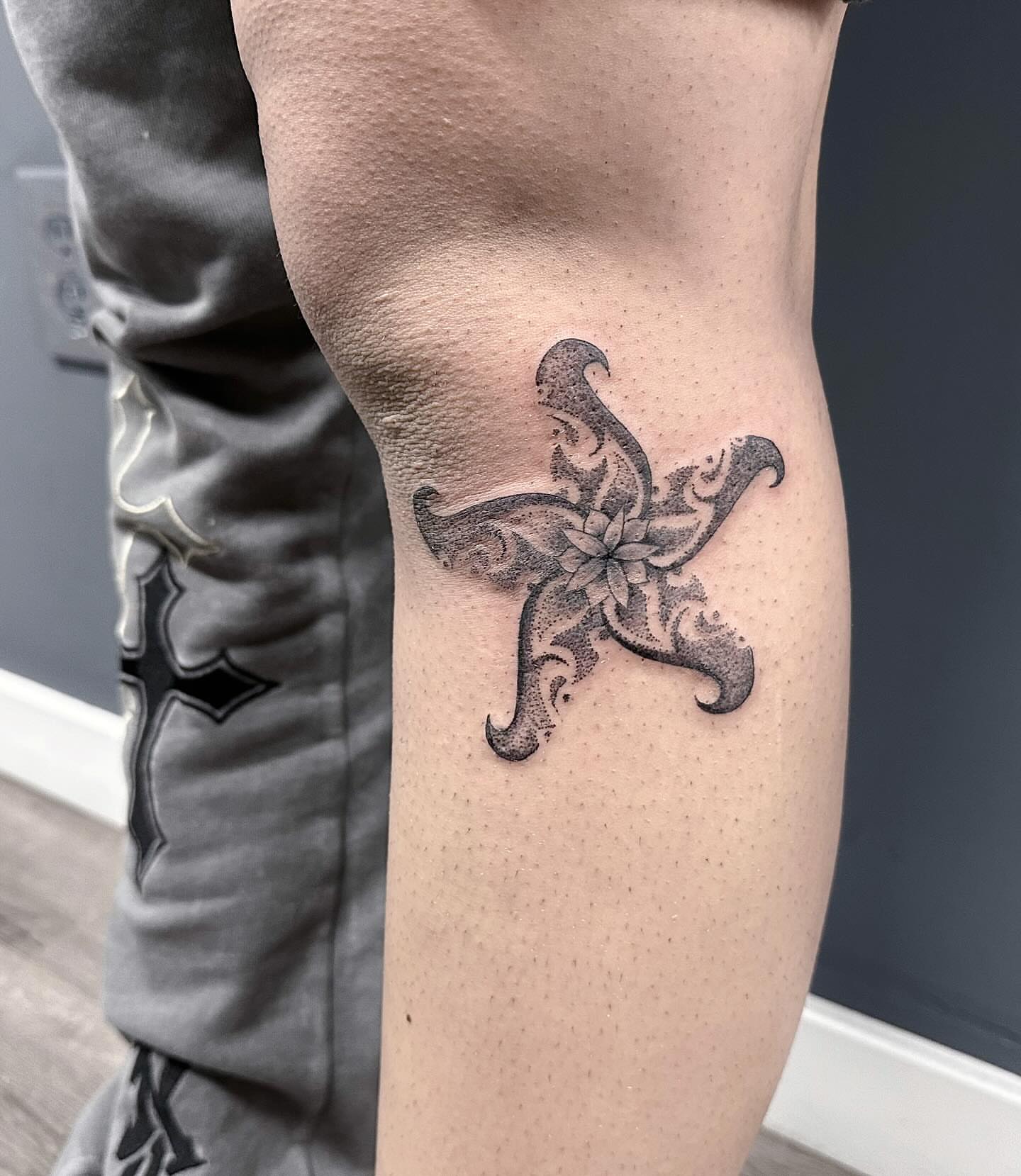 Starfish dotwork tattoo on the forearm by mia's tattoo, Los Angeles, California