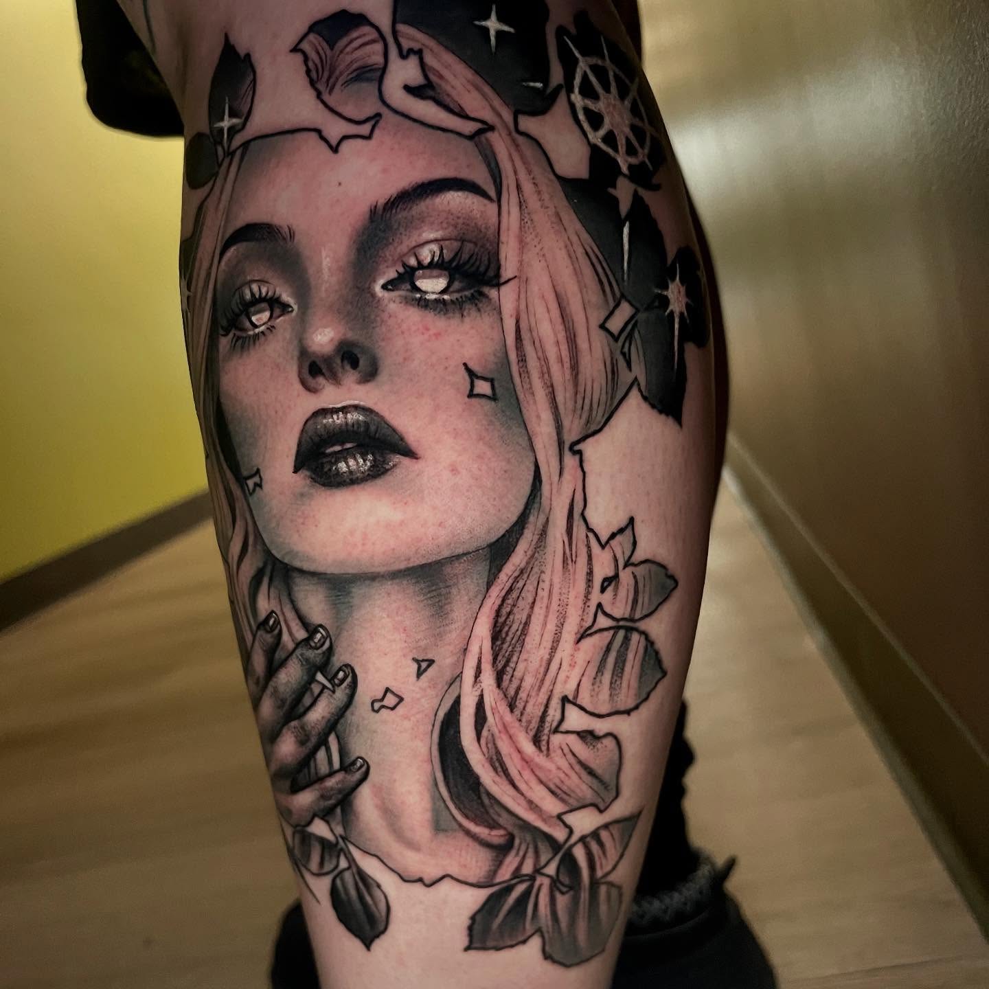 Woman's face realism tattoo on the forearm by Holli Marie