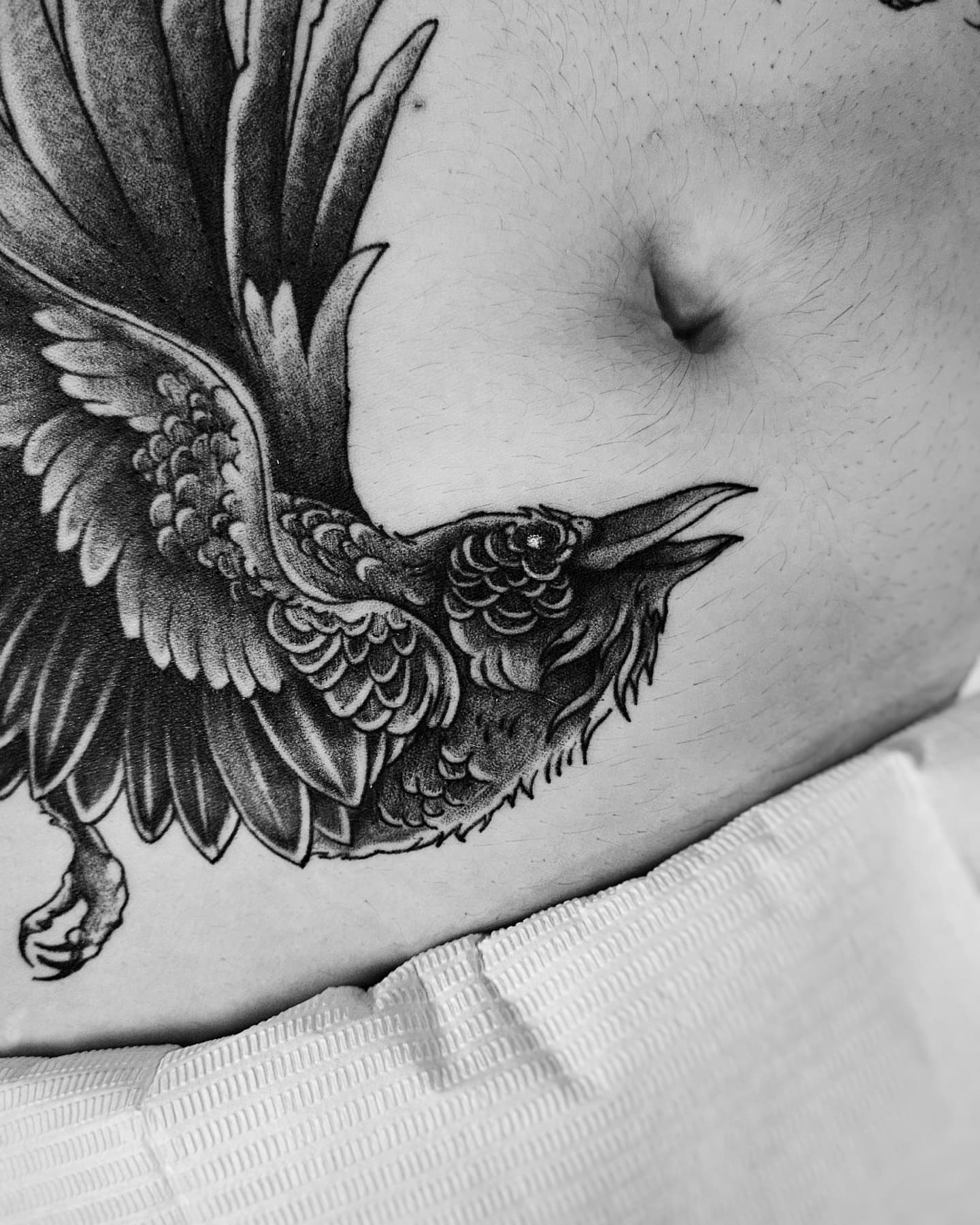 Crow black and grey tattoo on the ribs by ʙʀɪᴀɴɴᴀ 𝒁𝑶𝑴𝑩𝑹𝑰𝑬 ᴛᴀᴛᴛᴏᴏꜱ