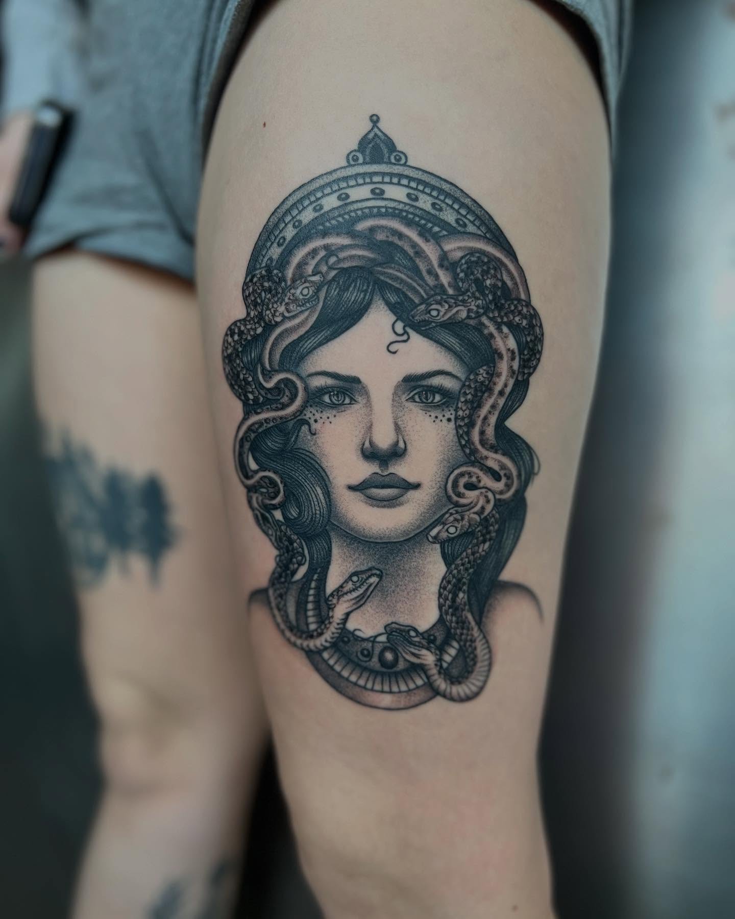 Medusa realism tattoo on the thigh by Siërra Nicole, Minneapolis, Minnesota