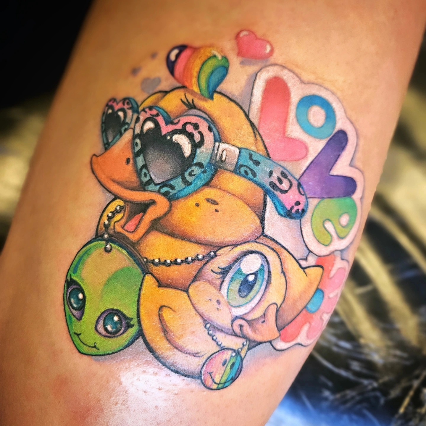 Kawaii characters new school tattoo on the forearm by Angell Tattoo Artist, Denver, Colorado