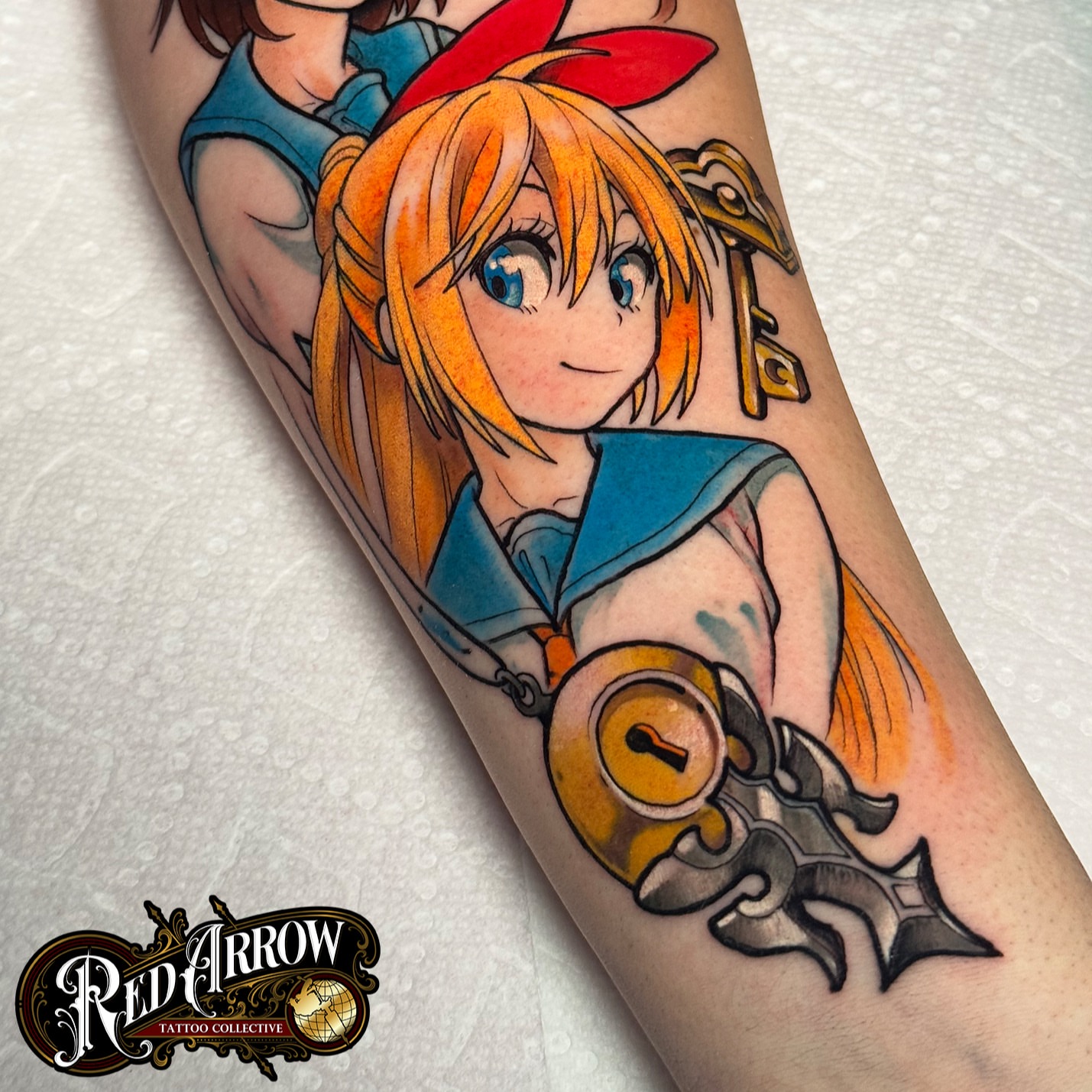 Anime character anime tattoo on the forearm by 𝕽𝖊𝖉 𝕬𝖗𝖗𝖔𝖜 𝕿𝖆𝖙𝖙𝖔𝖔 𝕮𝖔𝖑𝖑𝖊𝖈𝖙𝖎𝖛𝖊, Troy, Michigan