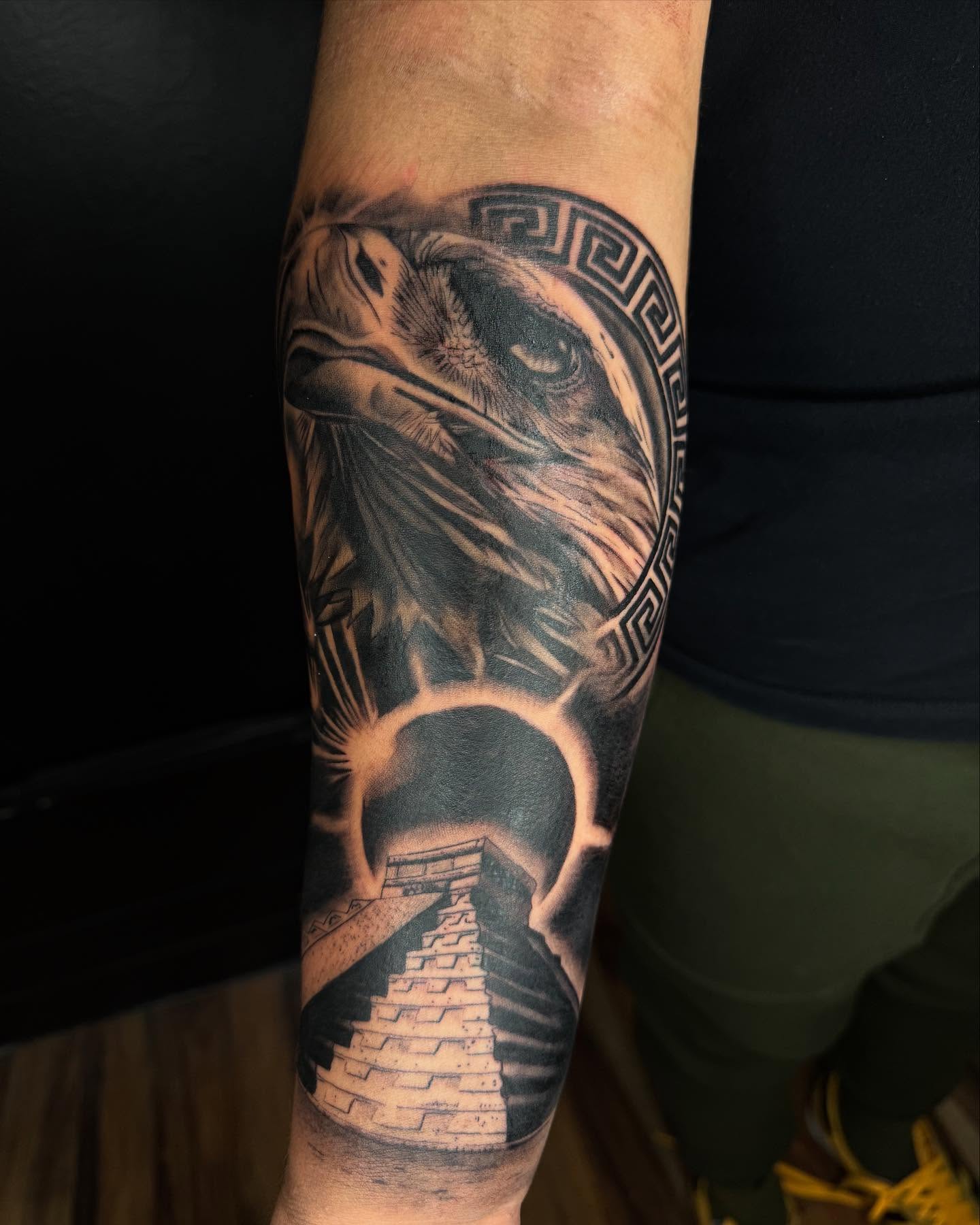 Eagle and pyramid realism tattoo on the forearm by Eduardo Chaparro