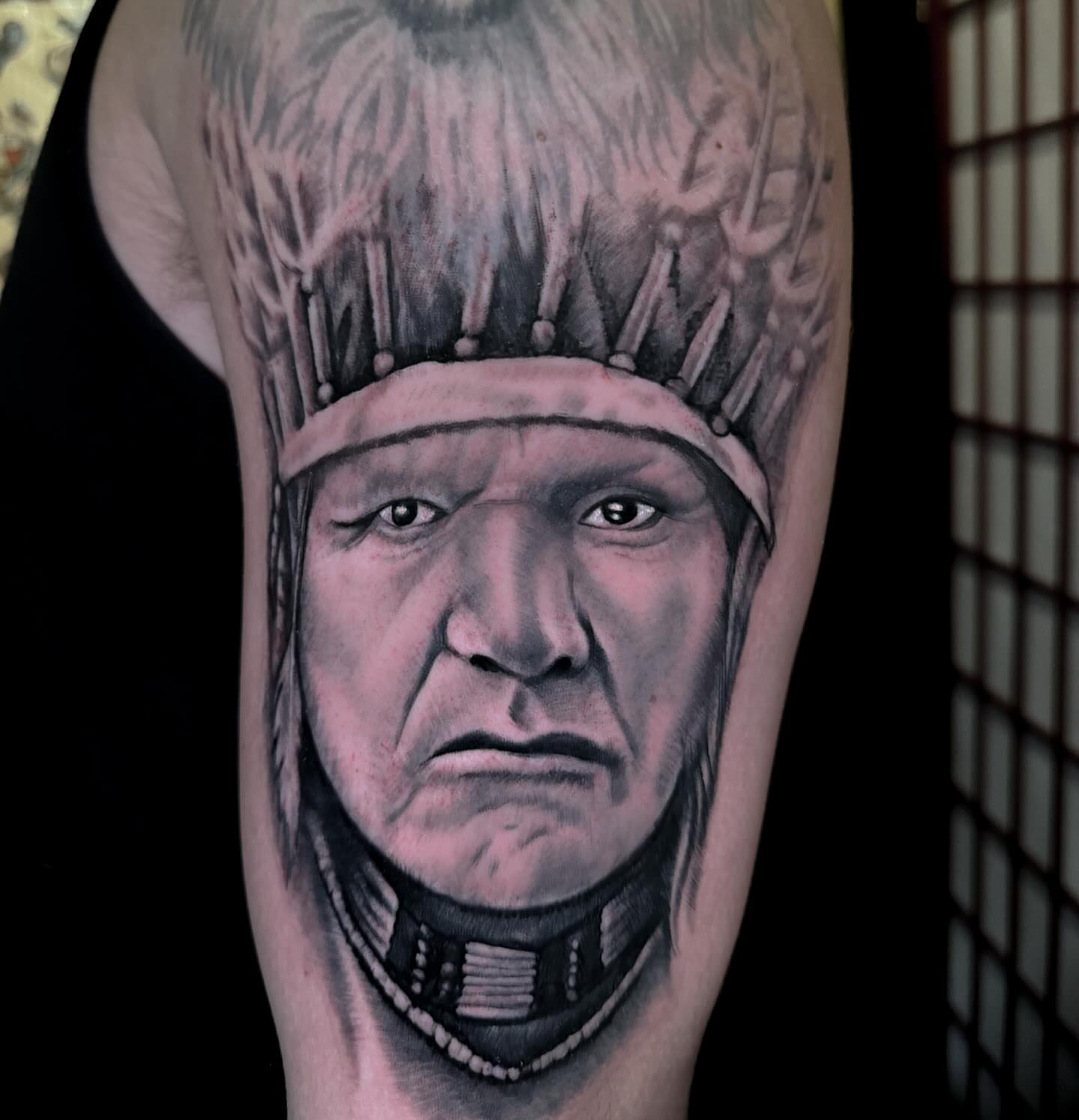 Indian chief realism tattoo on the forearm by Rob Keiuf