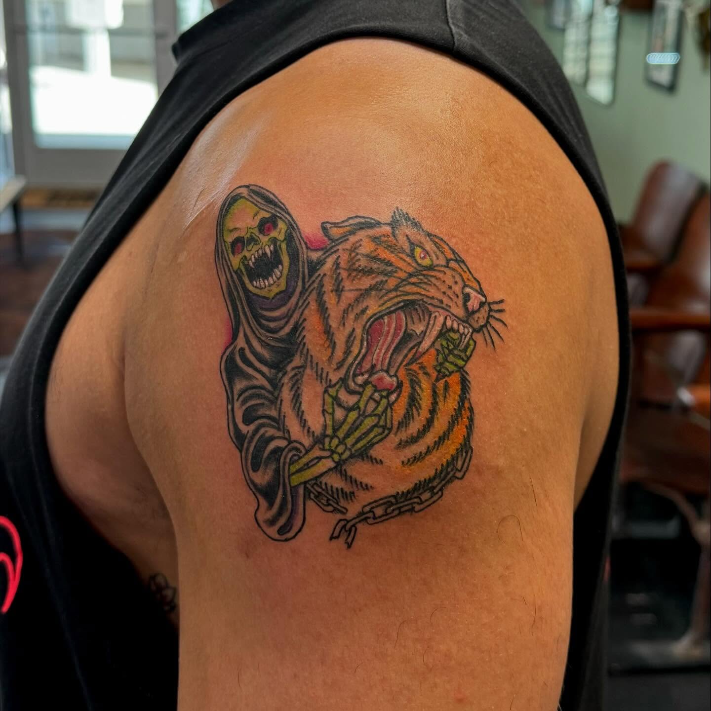 Tiger and grim reaper American traditional tattoo on the shoulder by Kenzie🖤