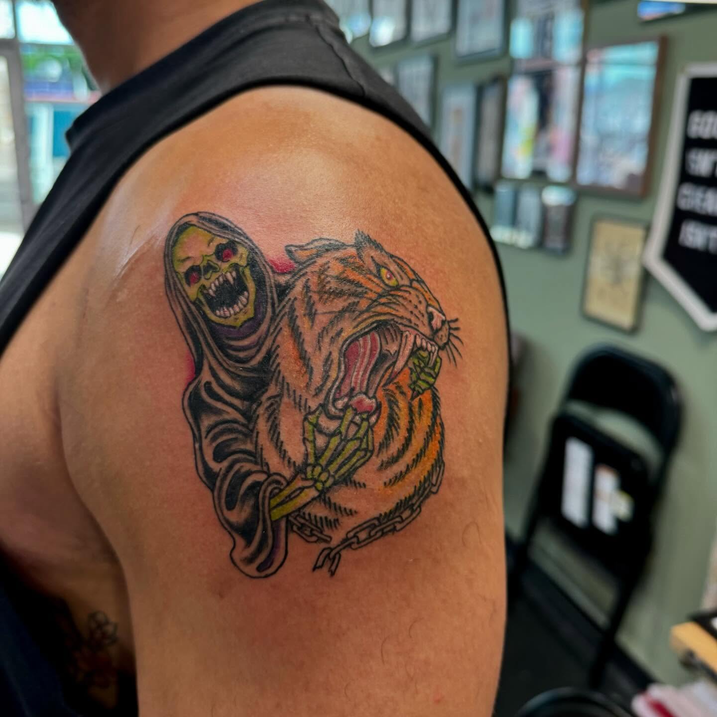 Grim reaper and tiger American traditional tattoo on the shoulder by Kenzie🖤