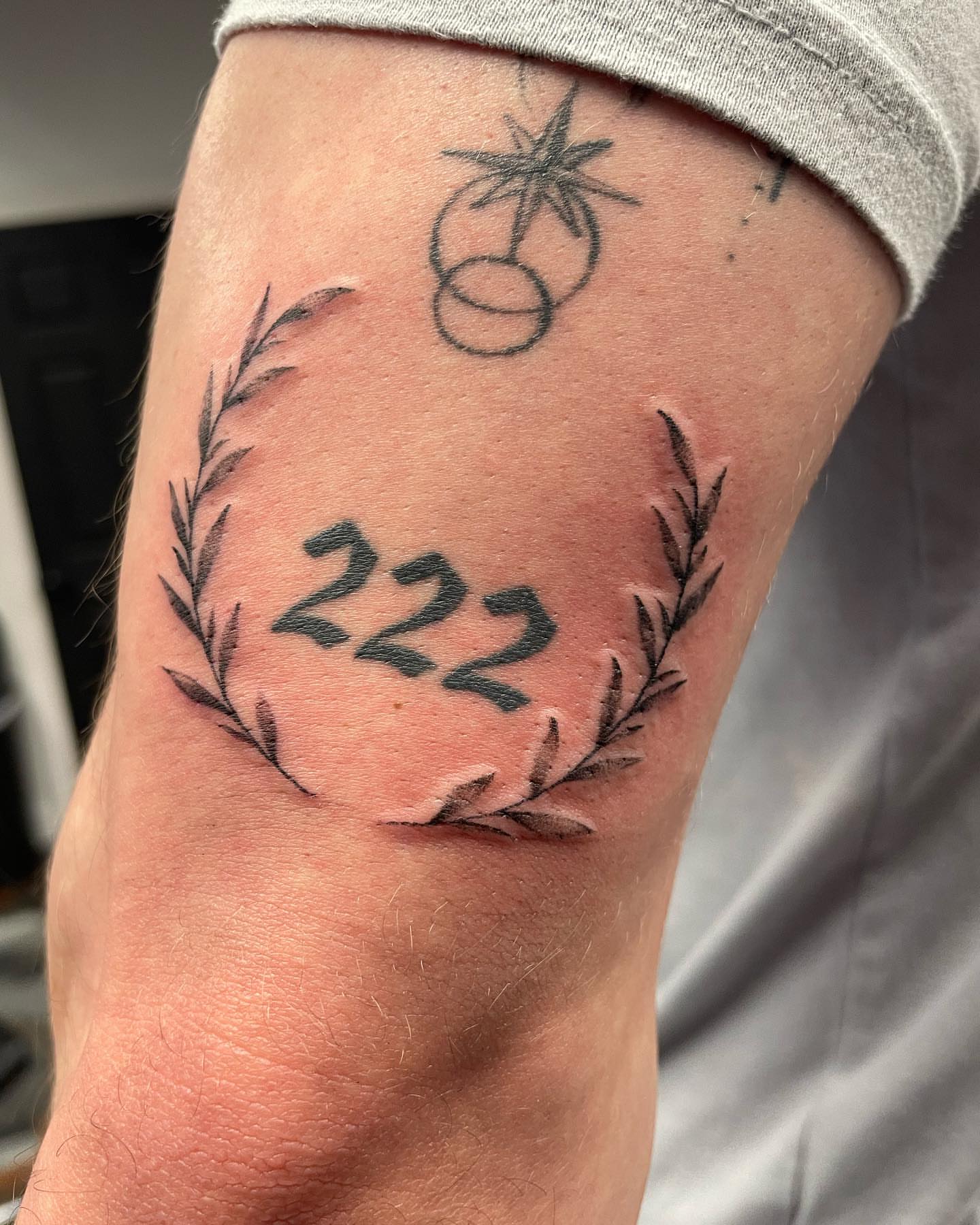 222 black and grey tattoo on the forearm by madison, Cincinnati