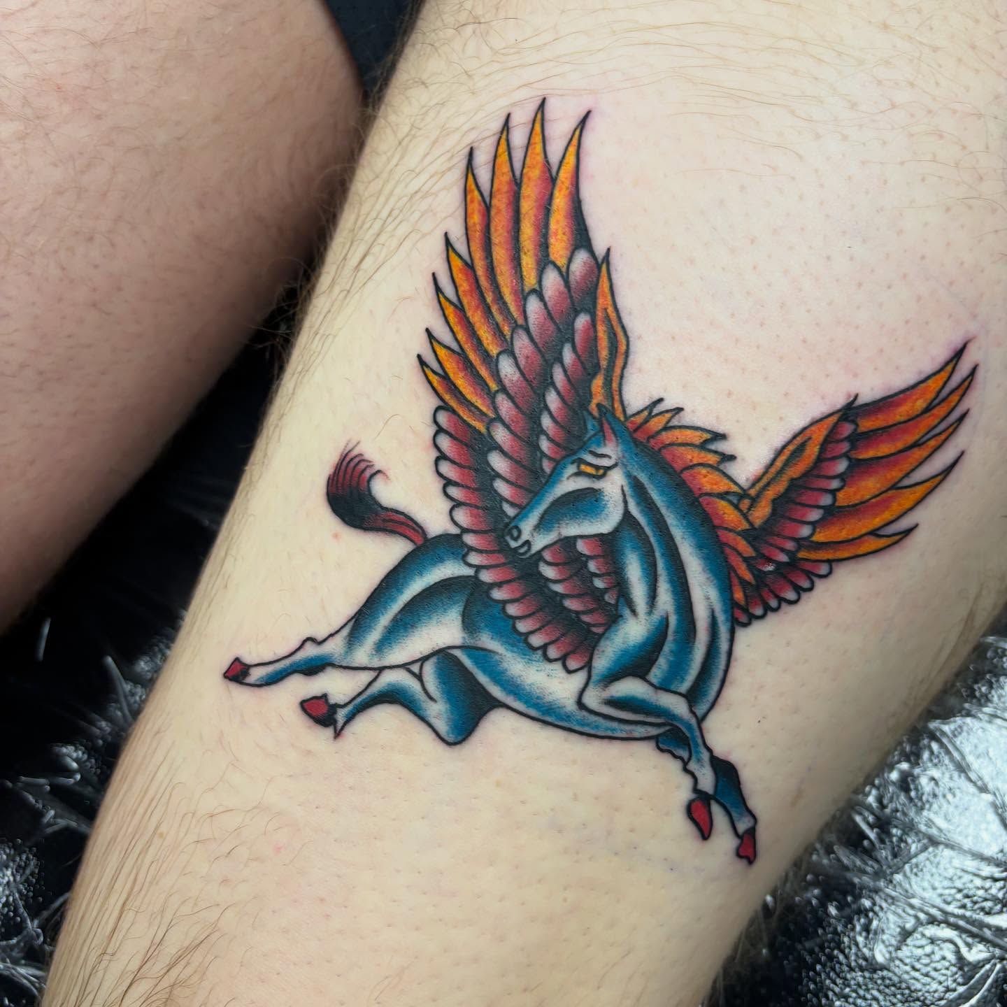 Pegasus American traditional tattoo on the forearm by 18 and older High End Tattoo