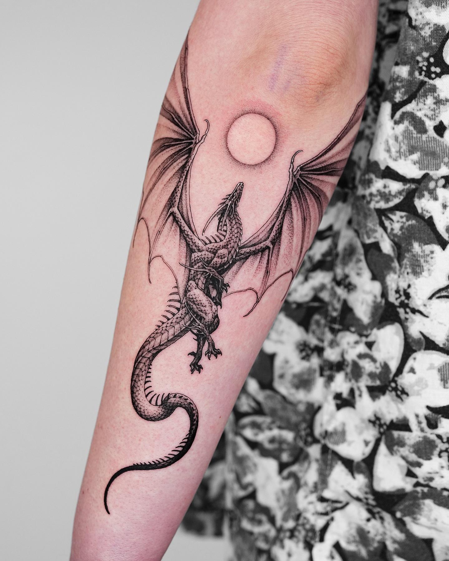 Dragon dotwork tattoo on the forearm by Intat