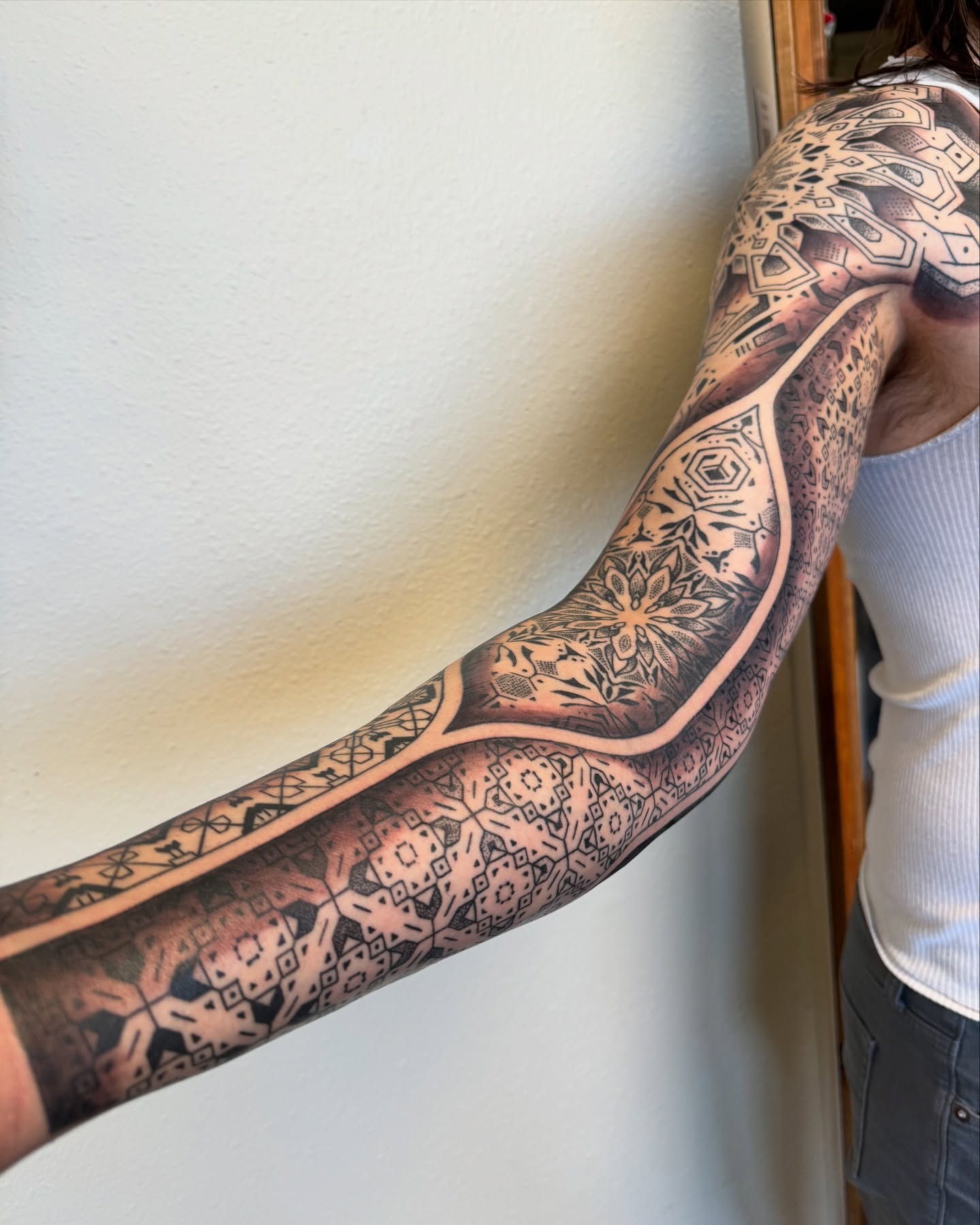 Geometric patterns geometric tattoo on the forearm by Ian Spencer