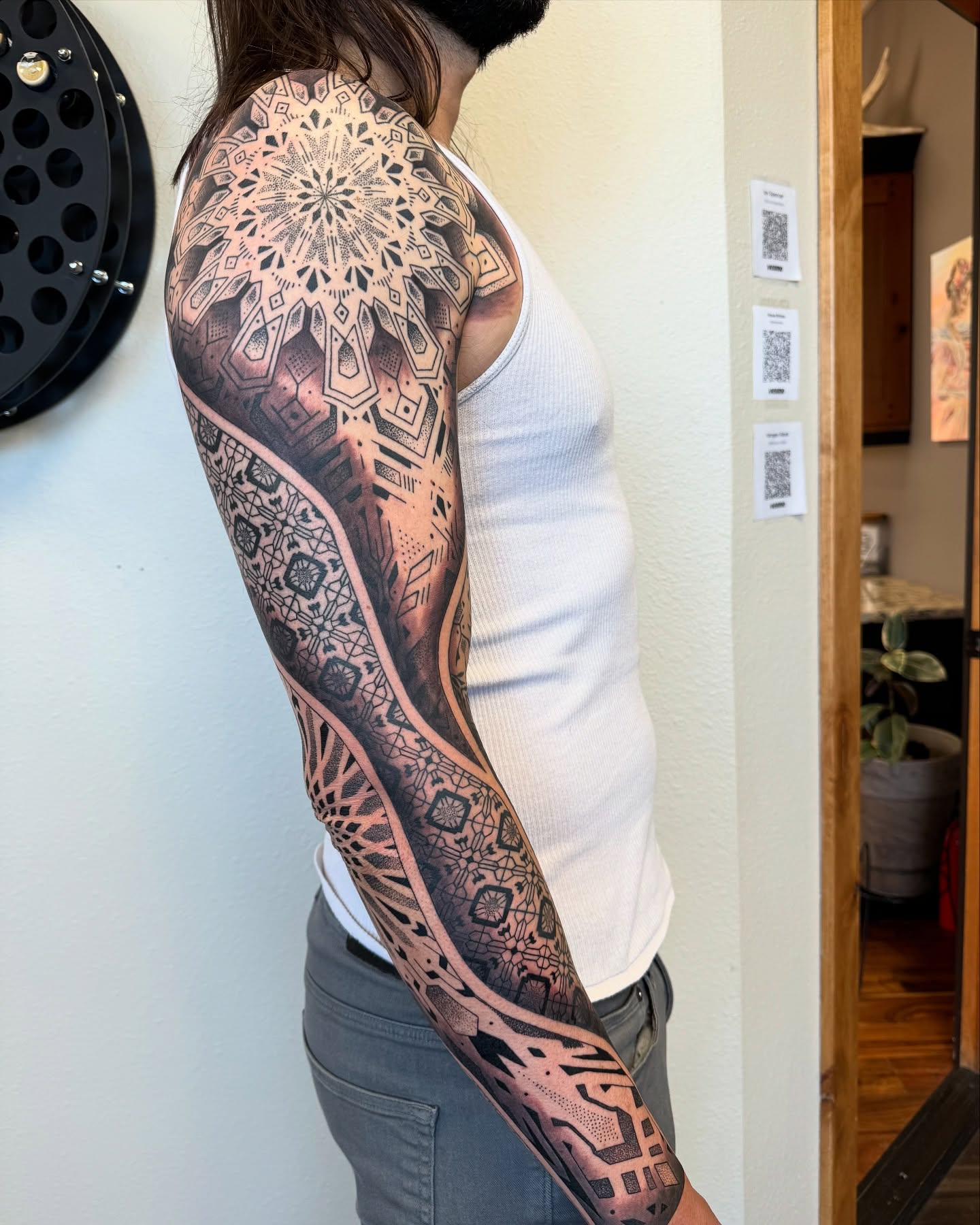 Geometric mandala geometric tattoo on the upper arm by Ian Spencer