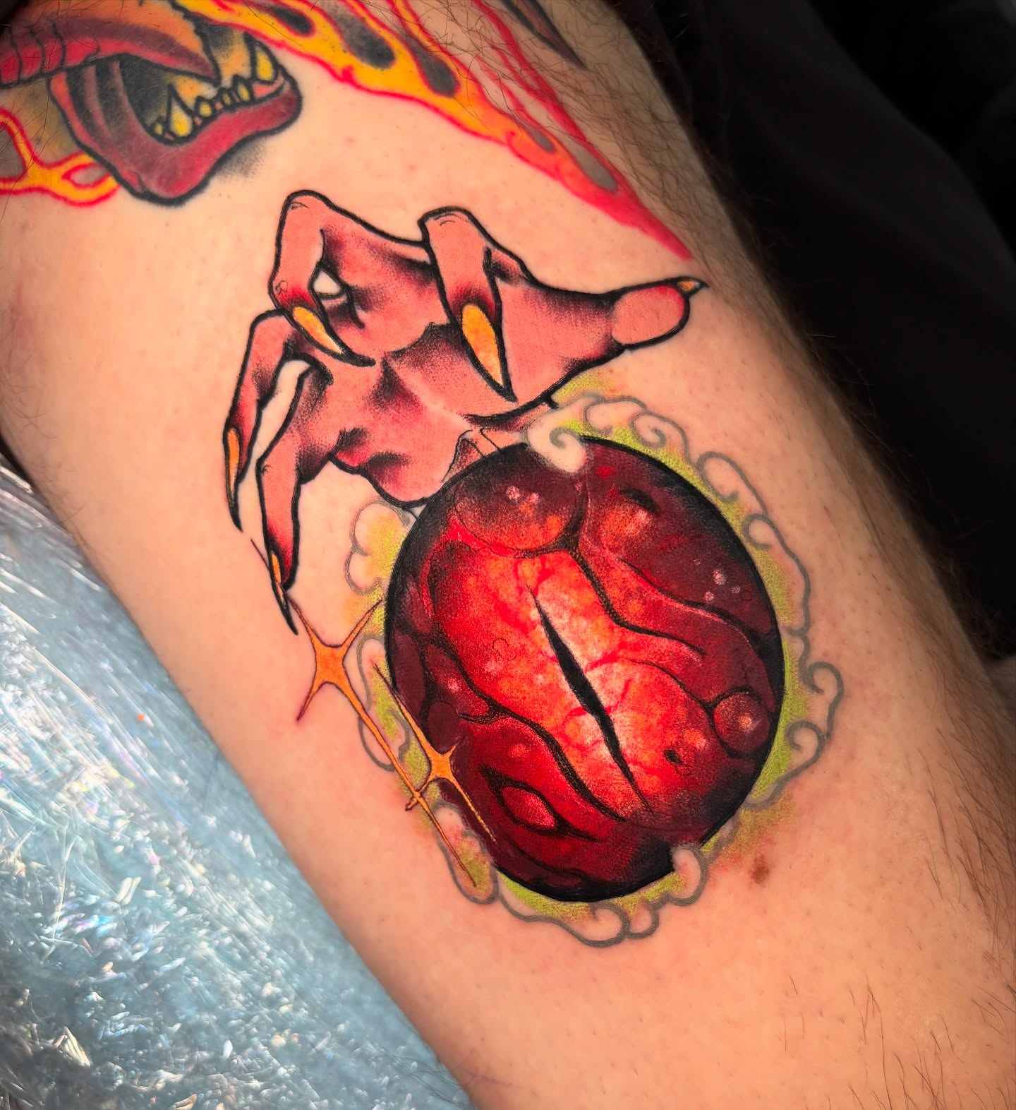 Heart with claws American traditional tattoo on the thigh by Matt Stolzenburg