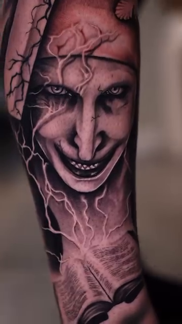 Demonic face with book and lightning dark realism tattoo by Esto