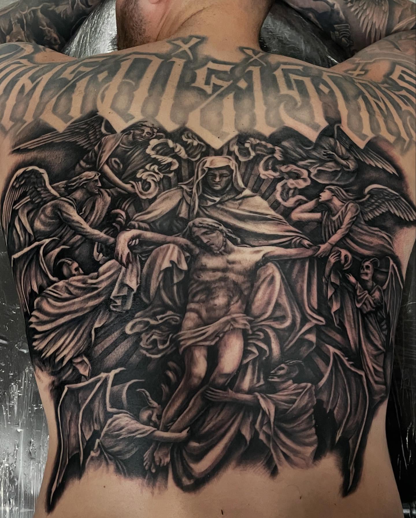 Religious crucifixion scene realism tattoo on the back by payaso