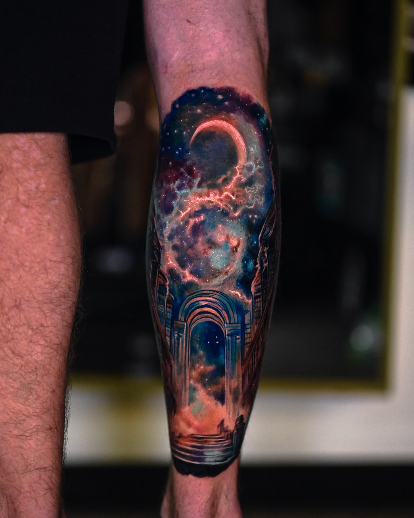Galactic nebula realism tattoo on the forearm by Marcos Salamanca