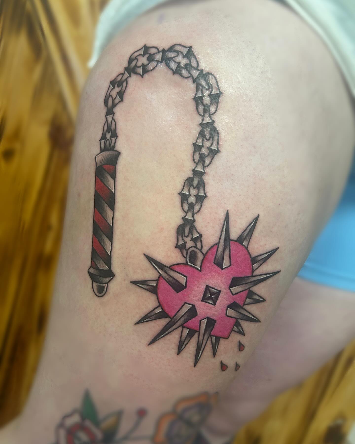 Nunchaku and spiked heart American traditional tattoo on the shoulder by ππππππ ππππππ