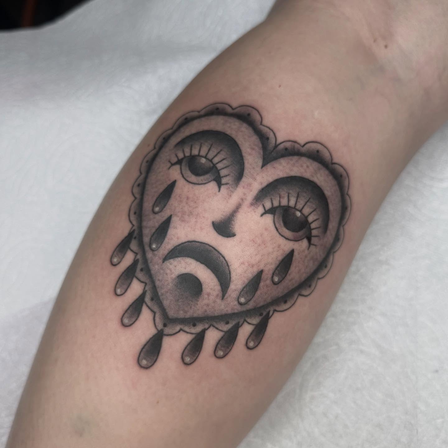 Sad heart black and grey tattoo on the forearm by chloe jeanel estrada