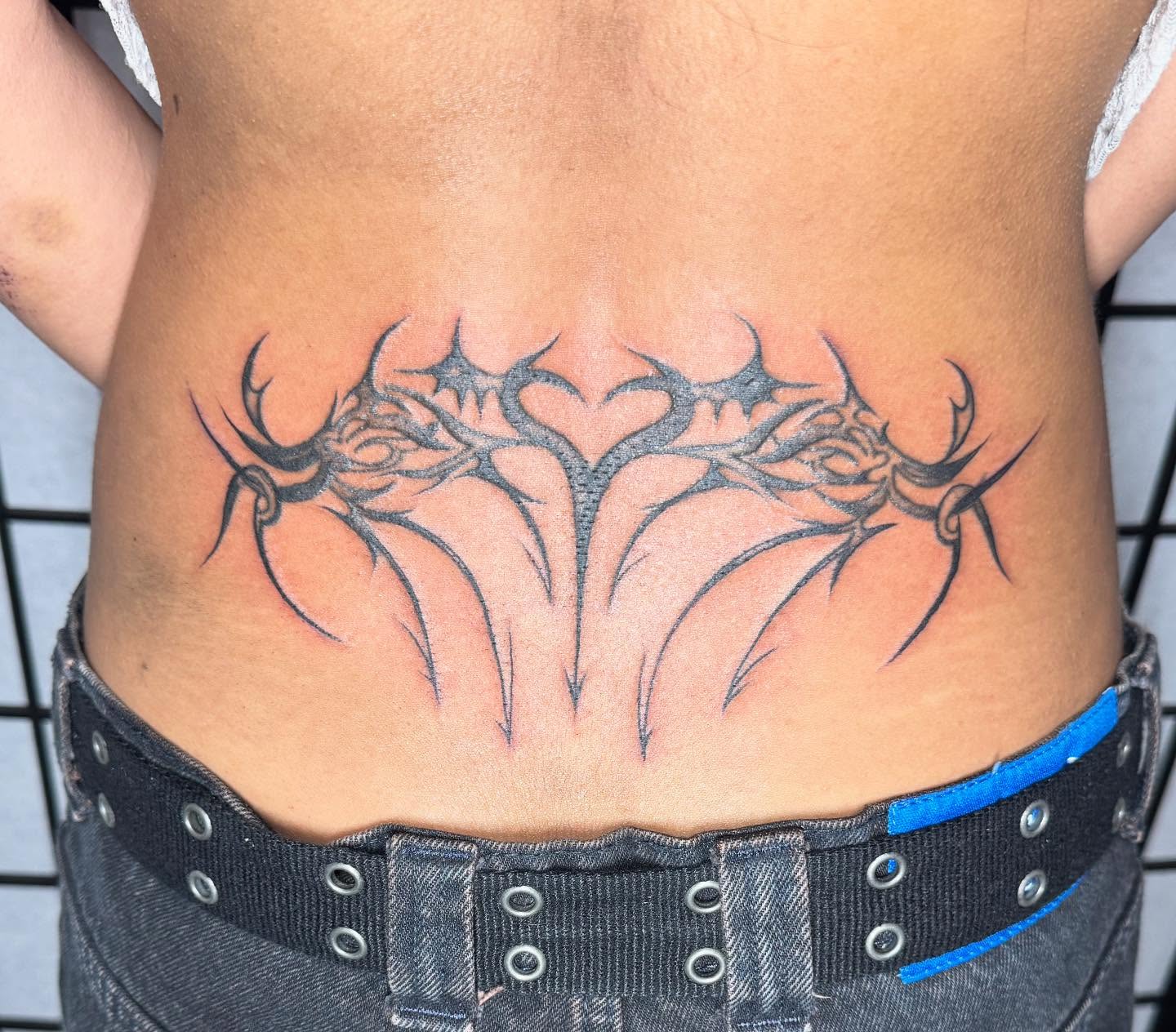 Antlers tribal tattoo on the torso by Justina🪐